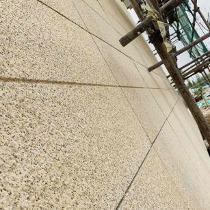 齐齐哈尔 黄金麻花岗岩荔枝面外墙干挂石材效果示例