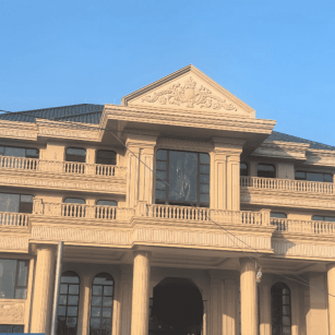 齐齐哈尔黄金麻别墅外墙干挂石材效果示例