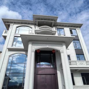 齐齐哈尔白麻别墅外墙干挂石材效果示例