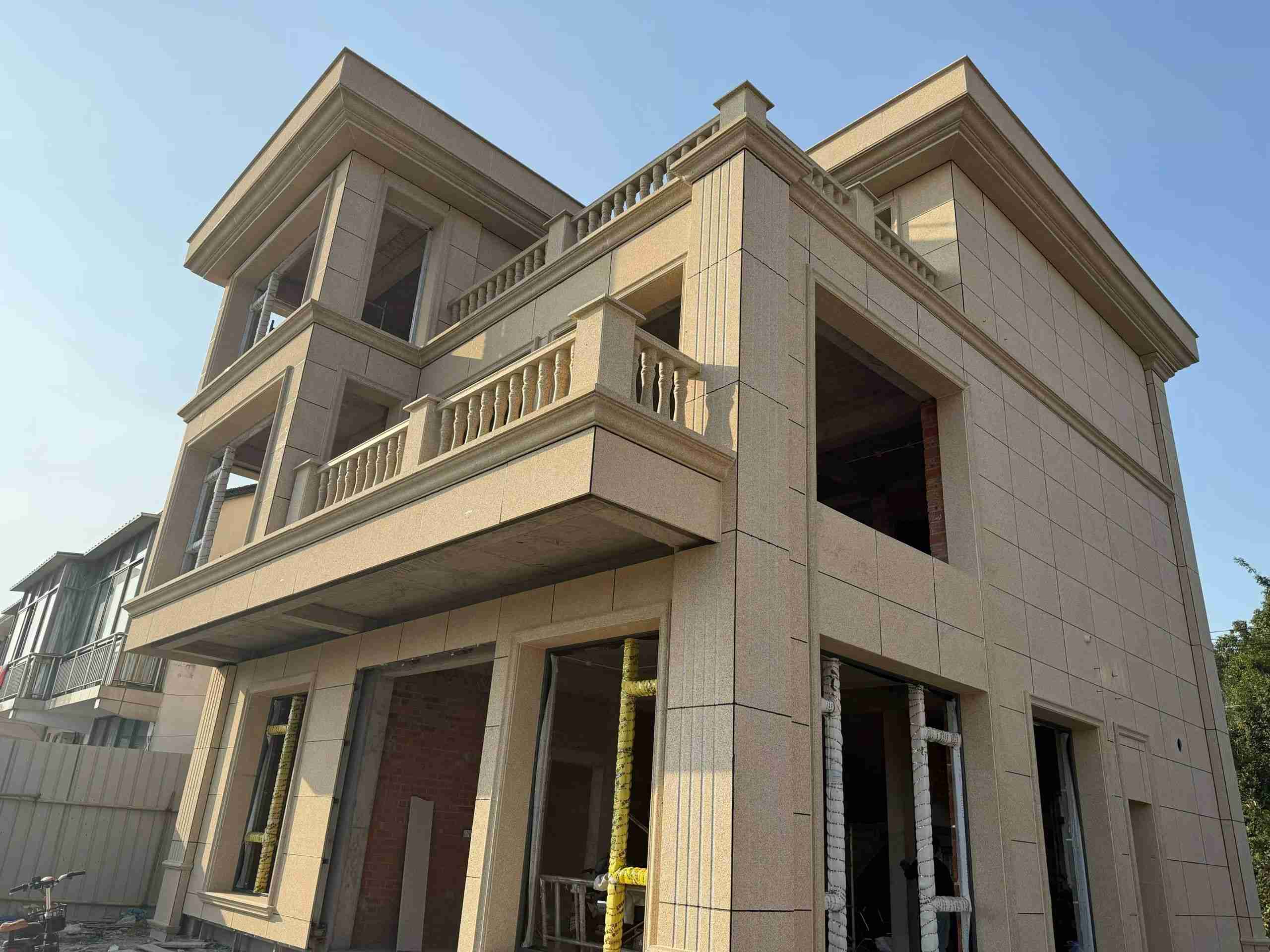 齐齐哈尔 黄金麻花岗岩石材荔枝面外墙干挂效果展示