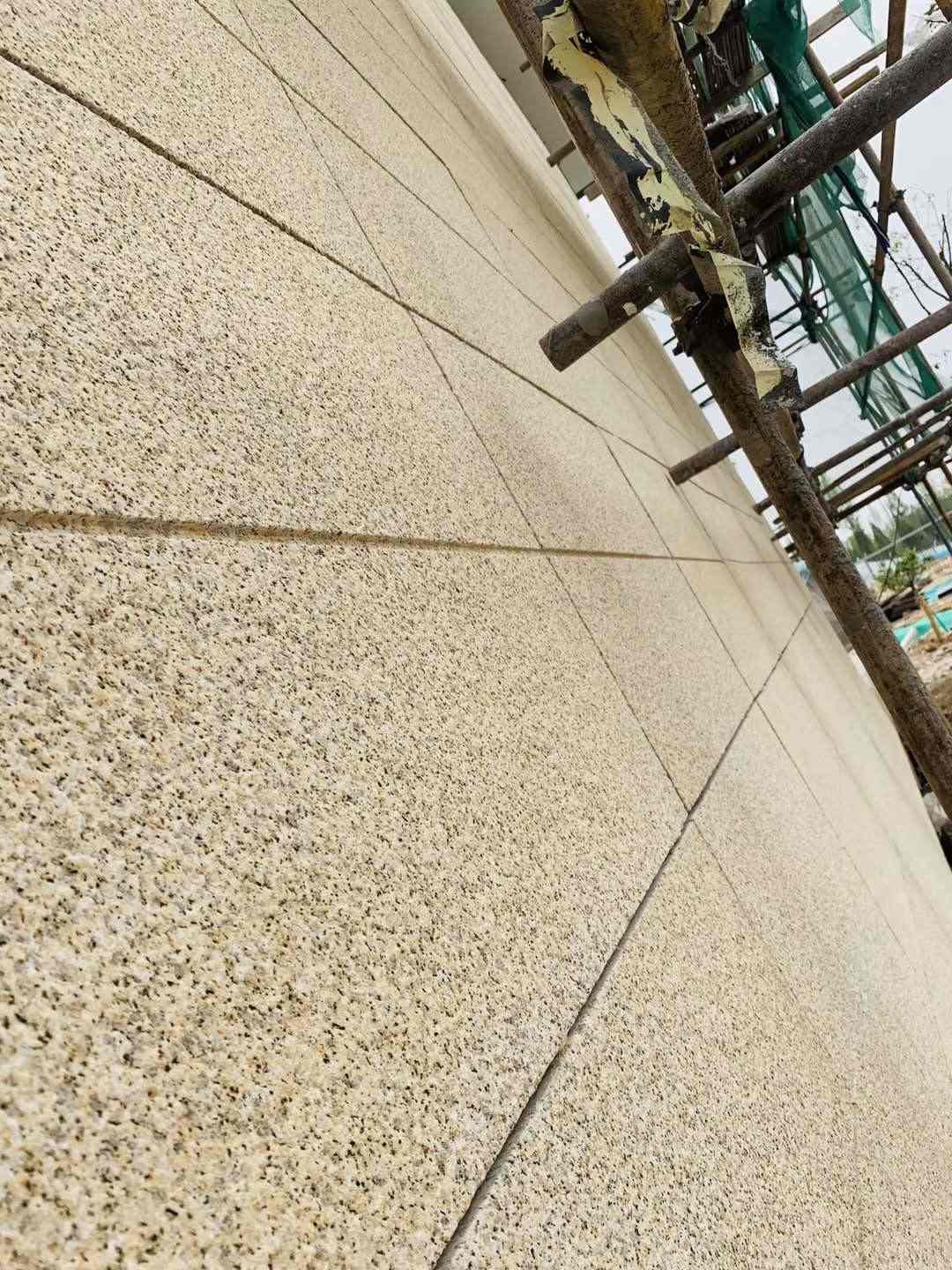 齐齐哈尔 黄金麻花岗岩荔枝面外墙干挂石材效果示例